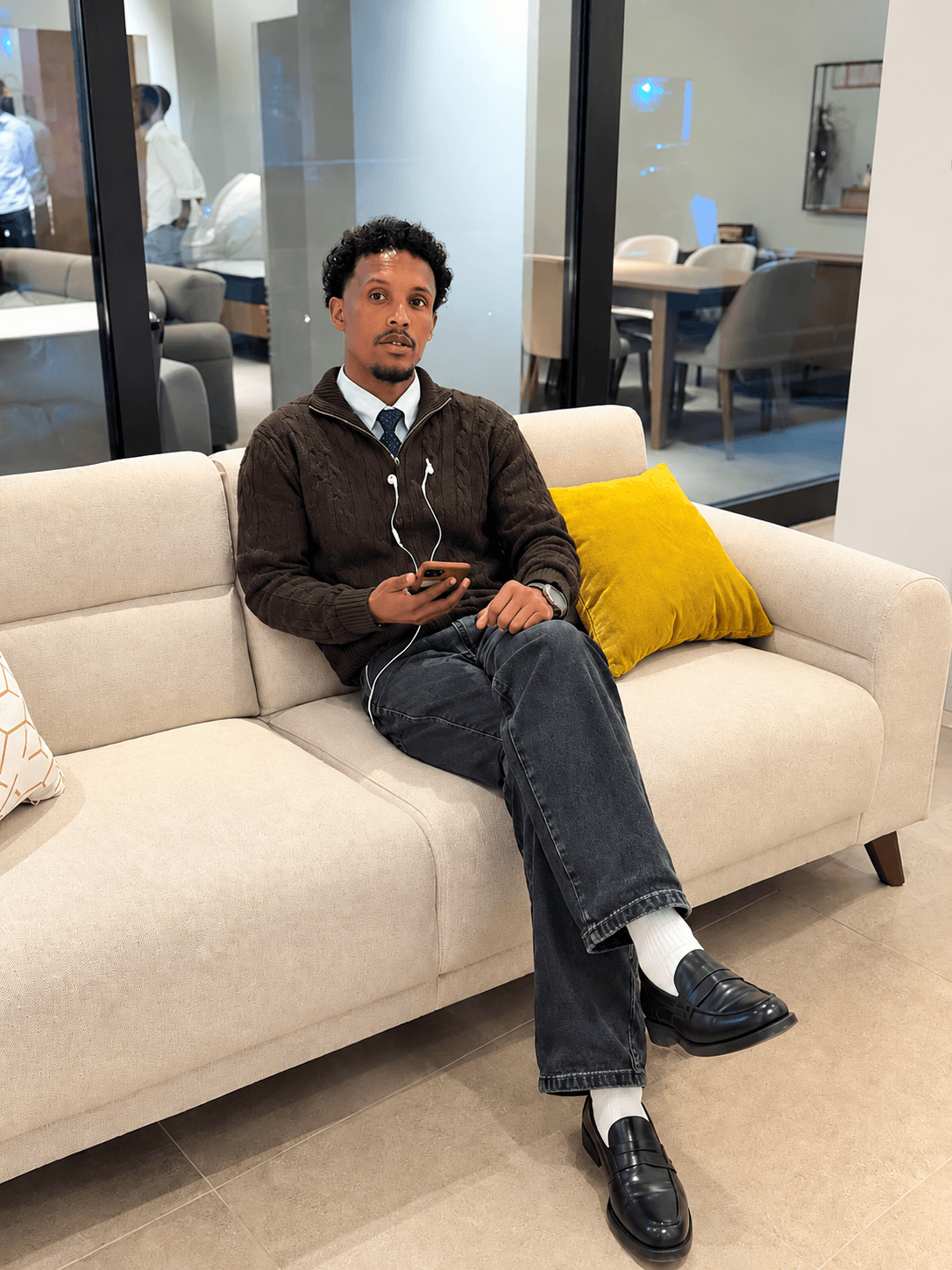 Khaire Mohamed in a modern office lounge